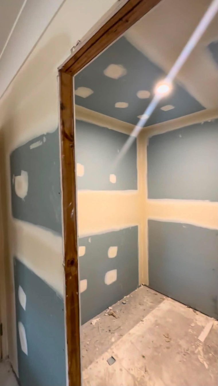 Internal wall framed and sheeted with the joints set ready for paint